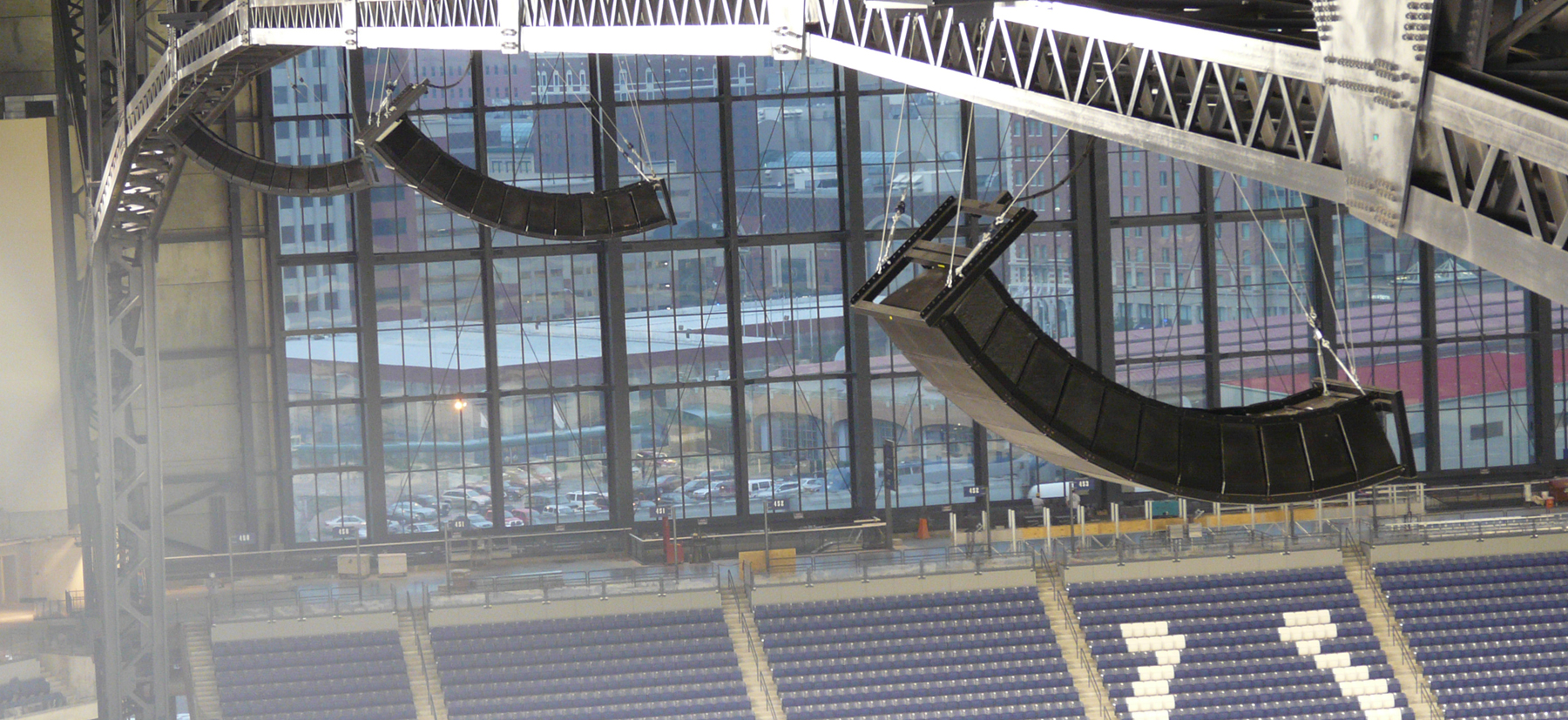 Suspended loudspeaker arrays at a stadium